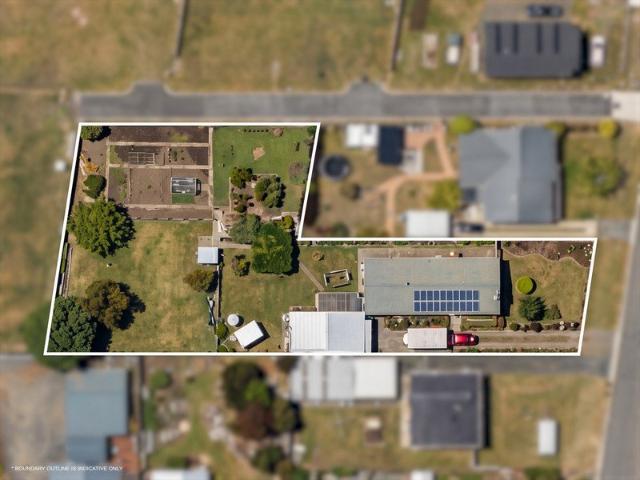 Rare Opportunity: Spacious 4 Bedroom Home on Over Half an Acre