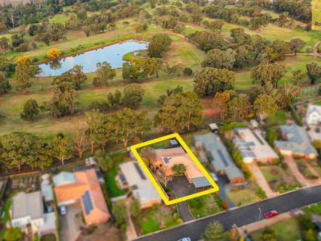 RARE OPPORTUNITY WITH GOLF COURSE ACCESS