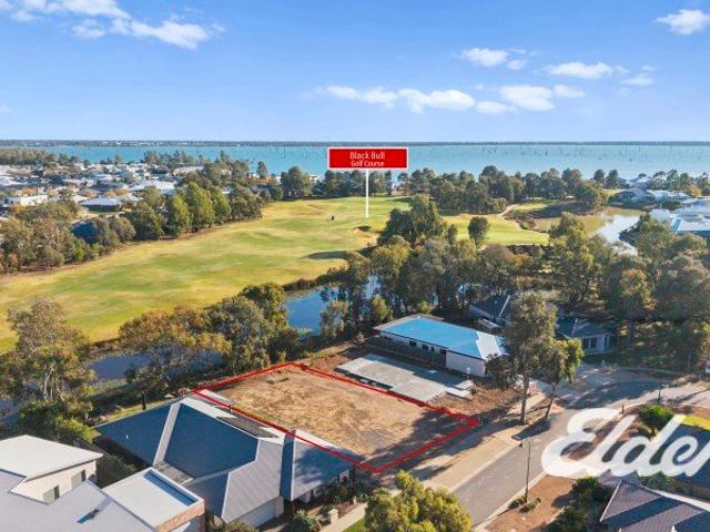 Rare Opportunity with Stunning Fairway & Waterway Outlooks