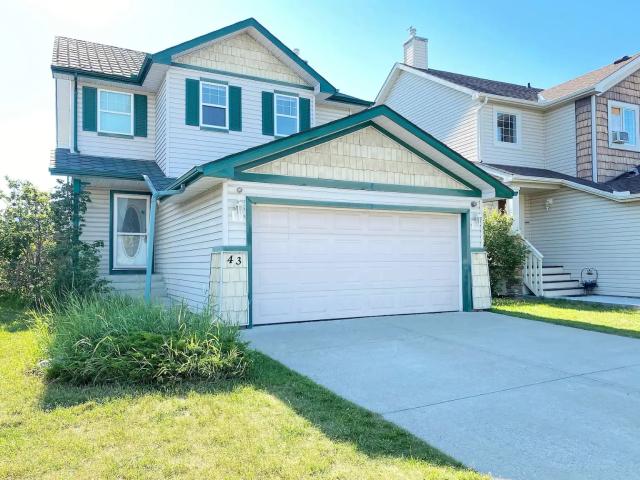 RARE OPPORTUNITY! 4 BEDROOM HOME W/ DOUBLE ATTACHED GARAGE IN OKOTOKS!