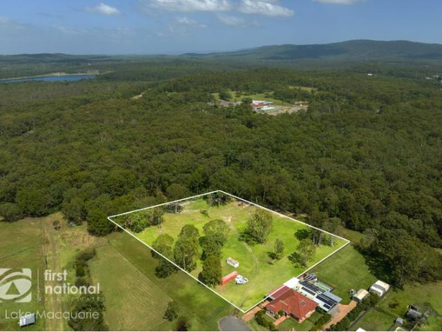 RARE ACREAGE IN SUBURBIA