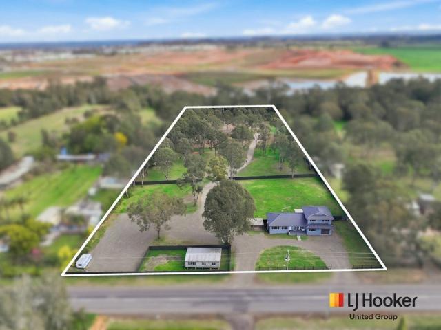 Rare Acreage, Spacious Living & Future Potential