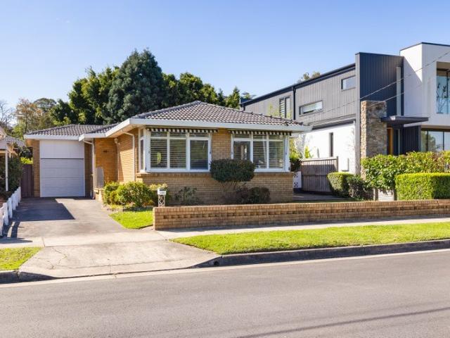 Rare bayside offering directly opposite park