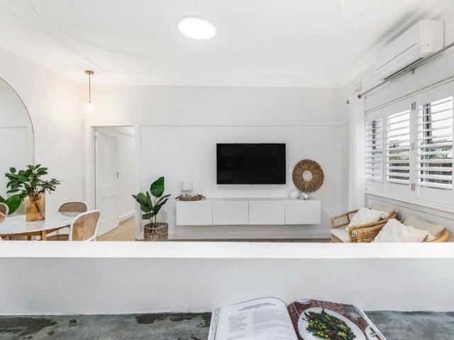 A Rare Garden Style Beachside Retreat with Private Courtyard