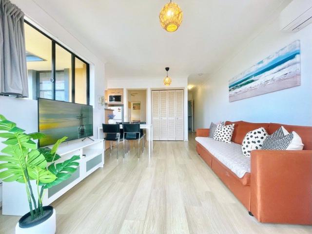 Rare Beachside Opportunity Bright Second Floor Apartment with Open Outlook & Extra Storage