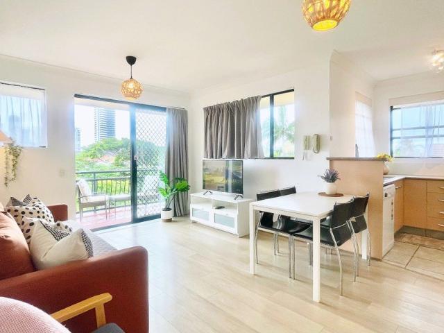 Rare Beachside Opportunity Bright Second Floor Apartment with Open Outlook & Extra Storage