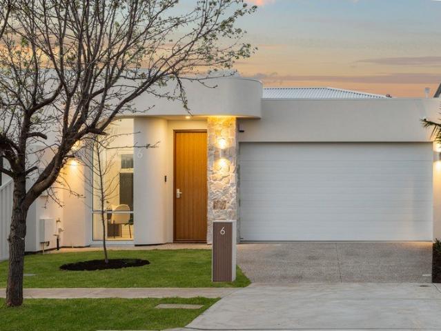 RARE BRAND NEW SINGLE STORY FAMILY HOME IN A SOUGHT AFTER BEACHSIDE SETTING