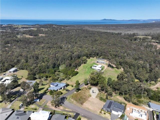Rare Coastal Gem with Unmatched Views in Tallwoods Village
