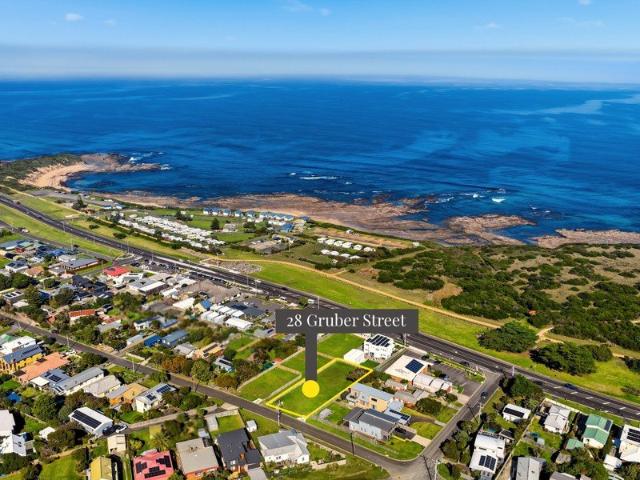Rare Coastal Opportunity: Titled Land with Dual Aspect Views
