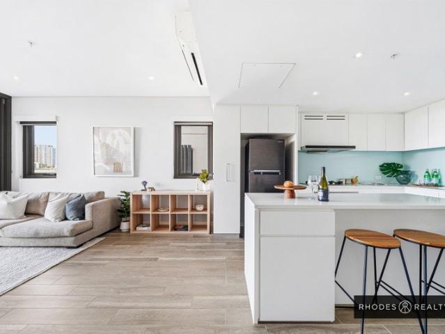 Rare Corner Apartment with Water Views, Wintergarden & Open Balcony