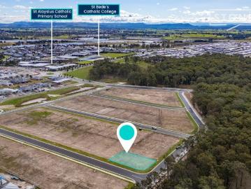 RARE CORNER BLOCK OPPORTUNITY IN THRIVING CHISHOLM