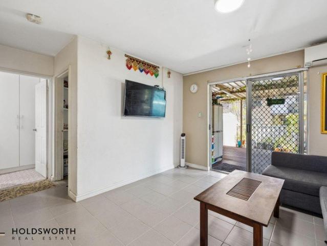 Rare Courtyard Living in an Ultra Convenient Location