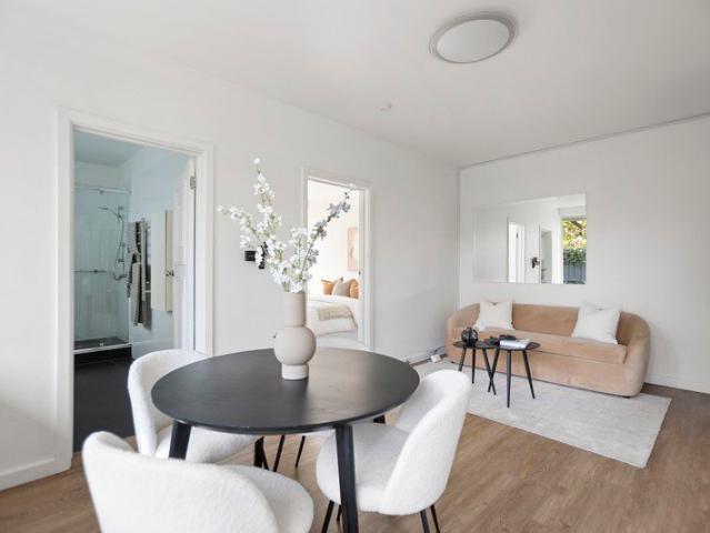 Rare Courtyard Living with Secure Parking in Prestigious Toorak