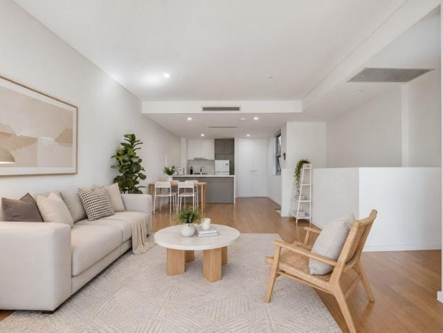 Rare Dual Level Apartment with Townhouse Style Living
