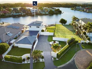 Rare Dual Title, Dual Living Waterfront Opportunity with Lucrative Potential
