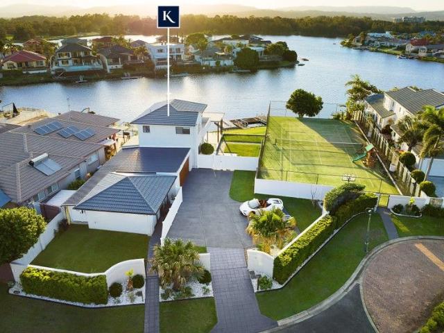Rare Dual Title, Dual Living Waterfront Opportunity with Lucrative Potential