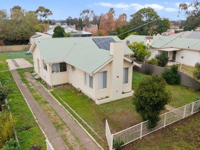 Rare dual title offering in prime town location!
