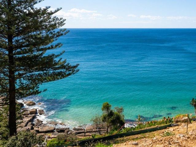 Rare DA Approved Oceanfront Land with Dolphin Bay Setting