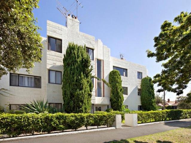 Rare Lock Up Garage Complements This Deco Gem