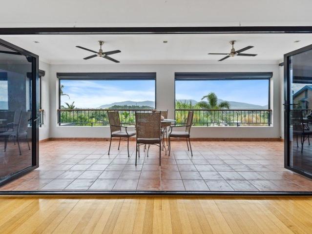 RARE ELEVATED ESTATE WITH PANORAMIC CITY AND GREEN ISLAND VIEWS