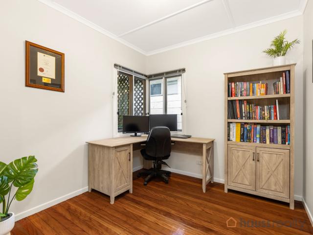 Rare find with endless possibilities in Corinda's high side