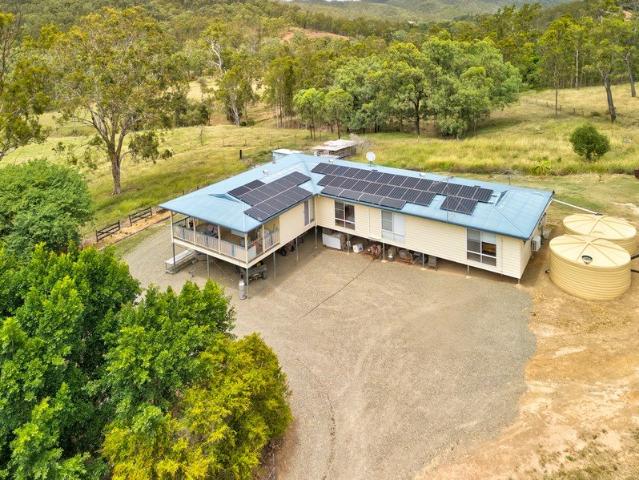 RARE GEM! 160 Acres with Natural Stream + Countryside Home with Magnificent Views