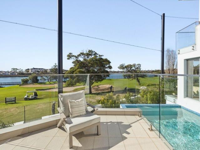 Rare Golf Course Frontage with Uninterrupted Water & City Views