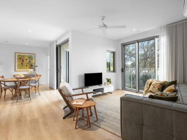 Rare Ground Floor Waterfront Gem with a Fenced Yard!
