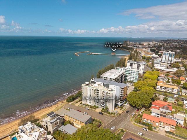 Rare Ground Floor Waterfront Retreat at Queens Beach