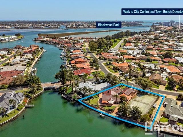 Rare Half Acre Canal Waterfront with Incredible Potential!