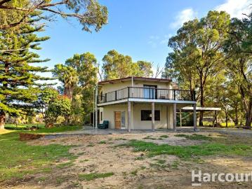 Rare Lakefront Acreage Renovators dream on 15 Acres with Endless Lifestyle Potential
