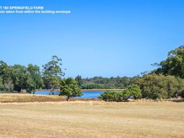 RARE LEVEL LAND WITH SWEEPING LAKE VIEWS