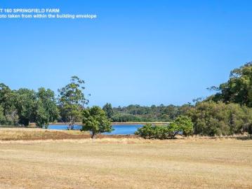 RARE LEVEL LAND WITH SWEEPING LAKE VIEWS