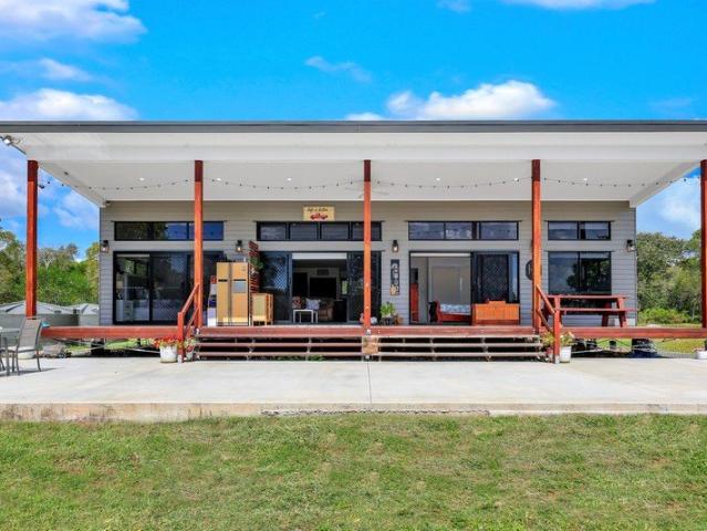 Rare Lifestyle Acreage With Income Potential Modern Home, Wedding Venue, Over 200m River Frontage & More!