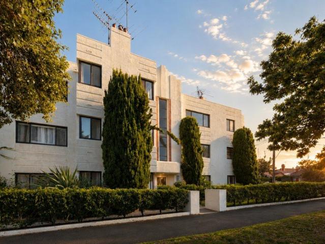 Rare Lock Up Garage Complements This Deco Gem