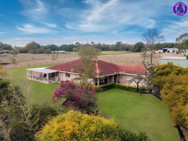 Rare Logan Reserve Lifestyle Estate | 3.66 Acres of Opportunity Minutes from Everything