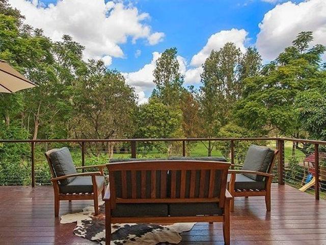 Rare Parkside Retreat with Uninterrupted Green Outlook