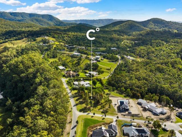 Rare prestige acreage opportunity in Hidden Woods Estate offers space, serenity and convenience