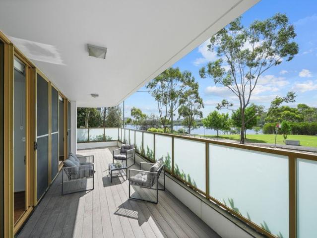 Rare Private Entry | Townhouse Style Waterfront Living with Space & Sunlight
