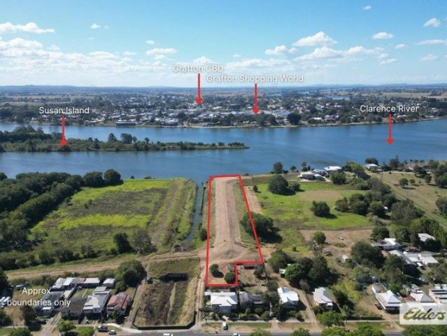 Rare Riverfront Acreage with Dual Titles & Building Opportunity