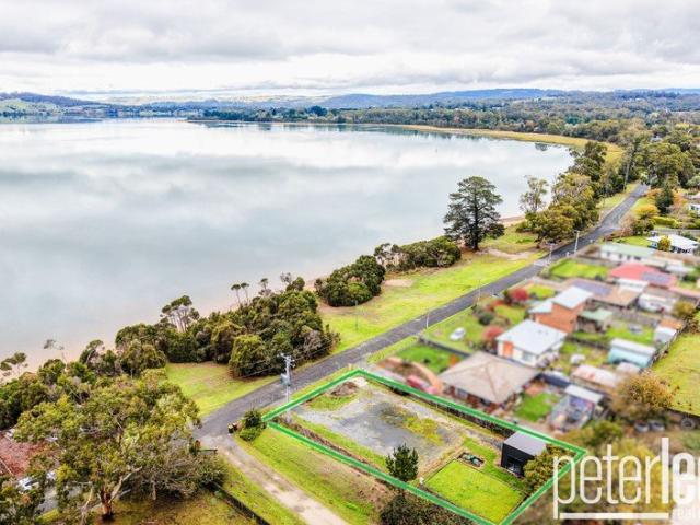 Rare Riverfront Opportunity Fully Serviced Ready to Build Block in Swan Point