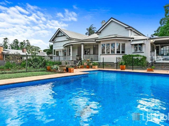 Rare Riverfront Opportunity in the Prestigious Doon Villa Precinct