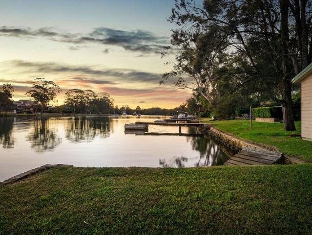 Rare Street to Water Opportunity with Sweeping River Views
