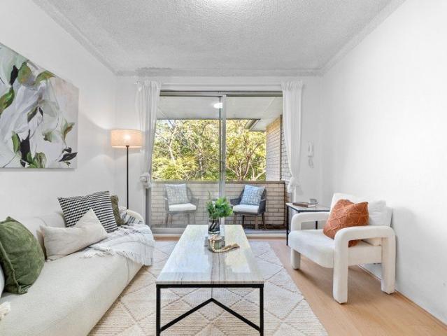 RARE THREE BEDROOM OFFERING | TASTEFULLY PRESENTED | PEACEFUL TOP FLOOR POSITION