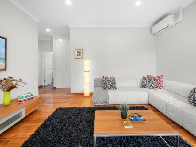 Rare Top Floor Apartment with Sweeping Local and Bay Views