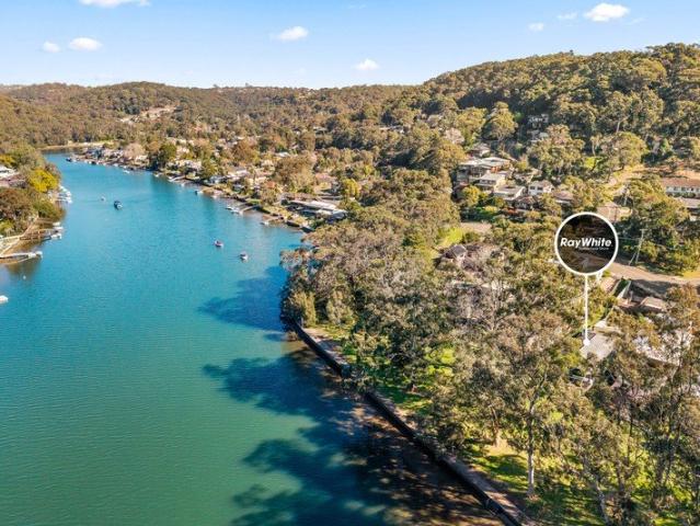 Rare Waterfront Reserve Opportunity with Endless Potential