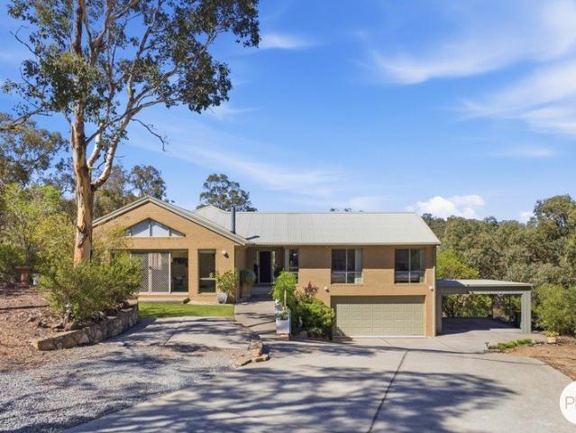 Rare 1.72 Acre Elevated Retreat in Blue Chip Greenleigh