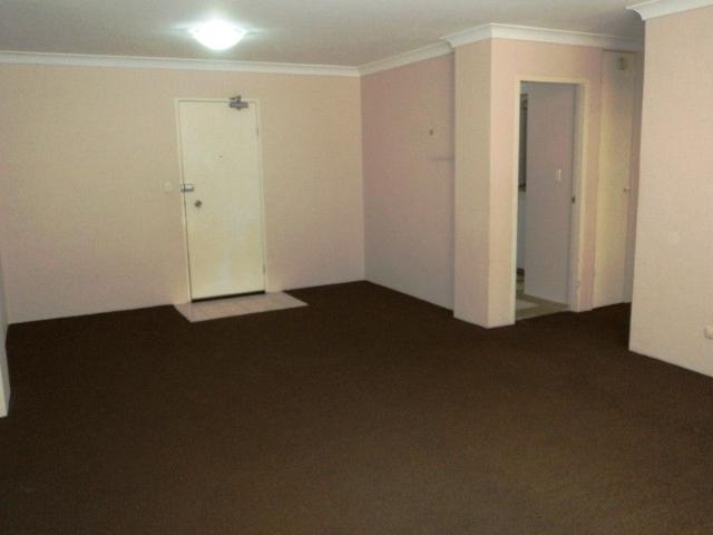 TWO BEDROOM WITH COURTYARD IN PRIME CBD LOCATION MOMENTS TO THE STATION