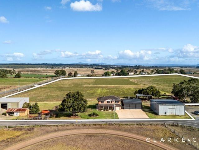 RARE 30.02 ACRE HOLDING WITH PRODUCTIVE FARMLAND AND SWEEPING VIEWS!