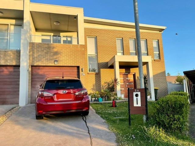 Rare 4 bedroom modern duplex, a short walk to Birrong shops, station & schools